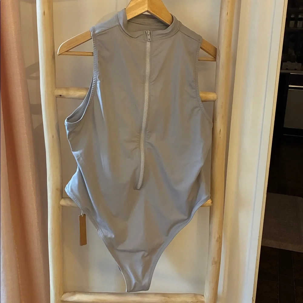Skims recycled swim sleeveless one piece.